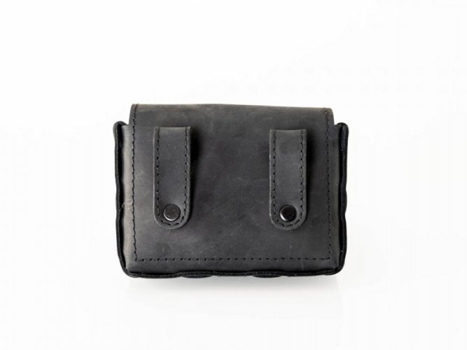 Elegant treat pocket made of black genuine leather